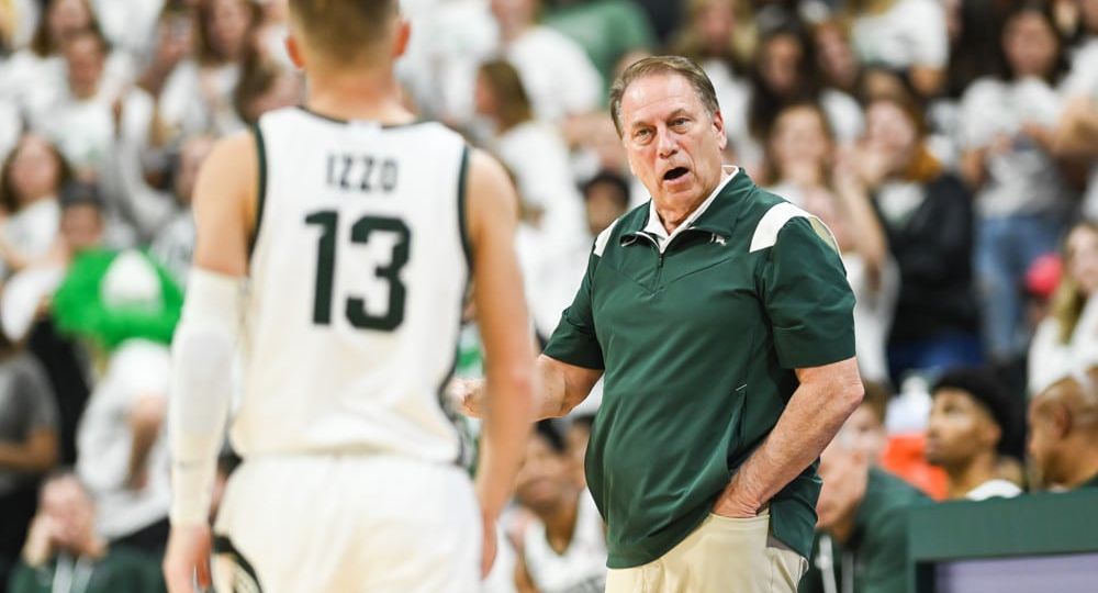 EAST LANSING, MI - NOVEMBER 7: Michigan State Spartans head coach Tom Izzo instructs his son, guard Steven Izzo (13) during a college basketball game between the Michigan State Spartans and Northern Arizona Lumberjacks on November 7, 2022 at the Breslin Center in East Lansing, MI (Photo by Adam Ruff/Icon Sportswire)