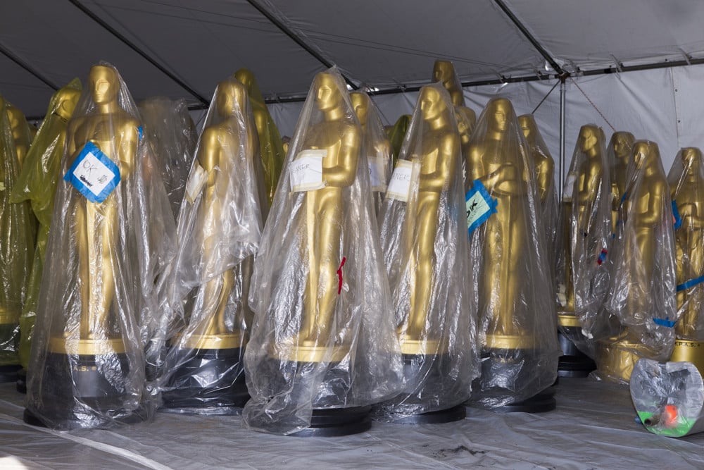 Oscar statues wrapped in plastic