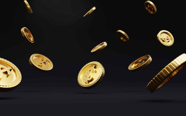 Closeup of golden USD coins dropping on dark background , Dollar