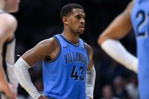 Eric Dixon about to shoot a free throw | college basketball betting trends