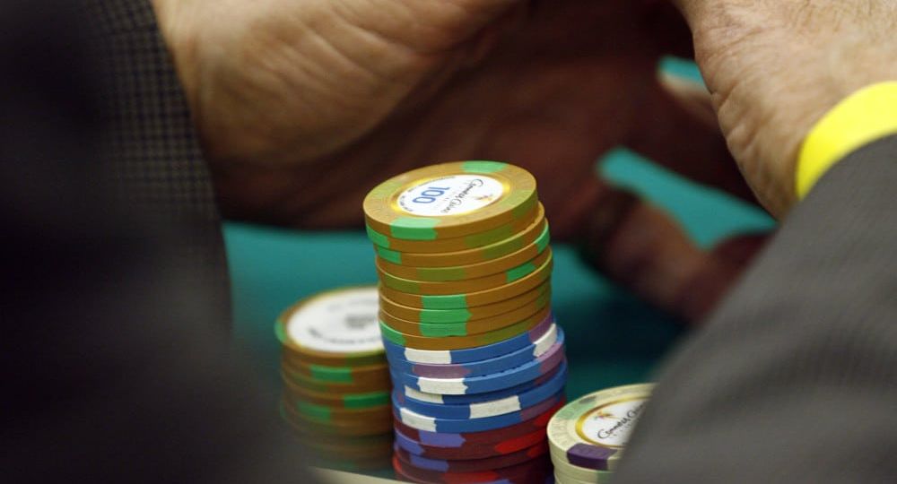 Guy playing roulette with chips