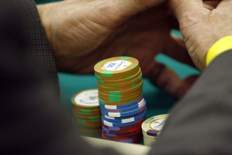 Guy playing roulette with chips